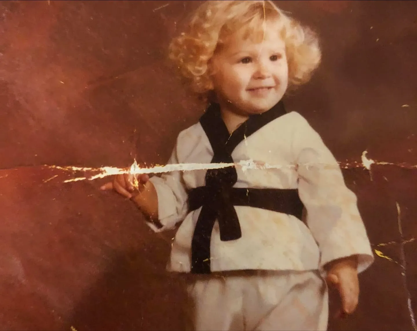 Young Tara Cox in her gi